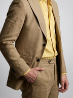 Man_wearing_yellow_shirt_202605121216_1.jpg